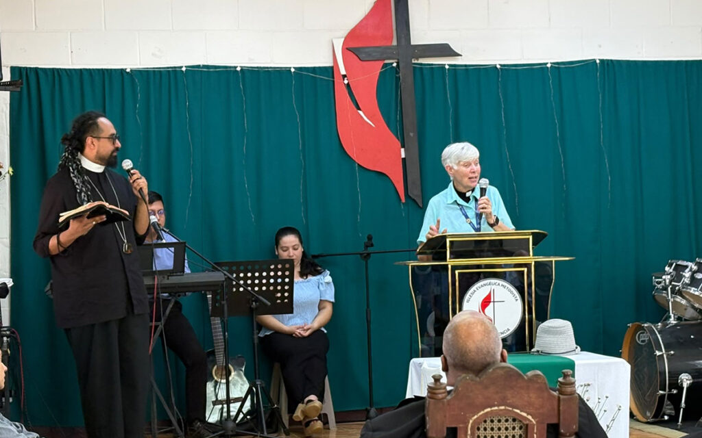 Rev Lyn Burden preaching at a remote village congregation
